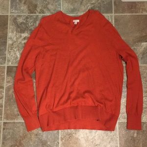 Men’s orange sweater